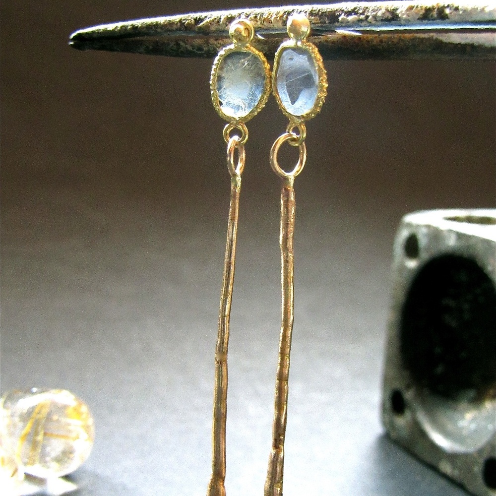 14k Yellow gold earrings with flat diamonds.